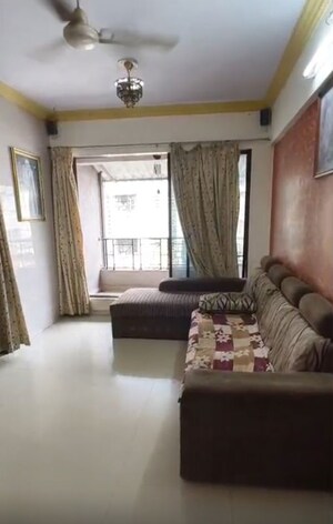 Living Room in 1 BHK Apartment at Rajaram Complex CHS, Dombivli West – for Sale