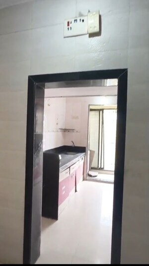 Kitchen in 1 BHK Apartment at Rajaram Complex CHS, Dombivli West – for Sale