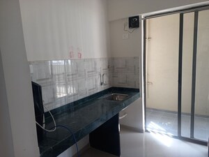 Kitchen in 1 BHK Apartment at Mantra Mesmer, Keshav Nagar – for Rent