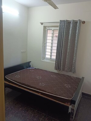 Bedroom in 2 BHK Builder Floor at Bda Layout Btm 4th Stage – for Rent