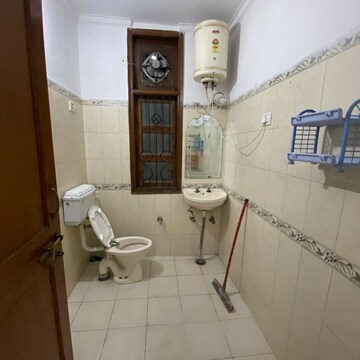 Bathroom in 2 BHK Builder Floor at Chattarpur – for Rent