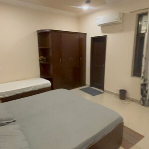 Bedroom in 6+ BHK Builder Floor at RWA Apartments Sector 52, Arun Vihar – for Rent