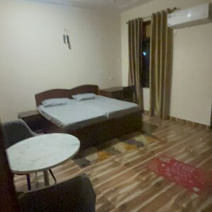 Bedroom in 6+ BHK Builder Floor at RWA Apartments Sector 52, Arun Vihar – for Rent