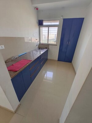 Kitchen in 2 BHK Apartment at Puraniks City Reserva, Ghodbunder Road – for Rent