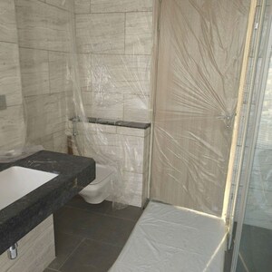 Bathroom in 5 BHK Apartment at Rustomjee Crown, Gokhale Road – for Rent