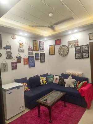 Living Room in 3 BHK Apartment at Emaar Palm Gardens, Sector 83 – for Sale