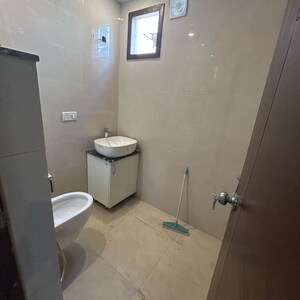 Bathroom in 4 BHK Builder Floor at South Extension I – for Sale