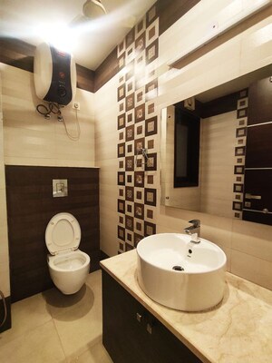 Bathroom in 4 BHK Apartment at Ansal Sushant Floors, Sushant Lok ii – for Sale