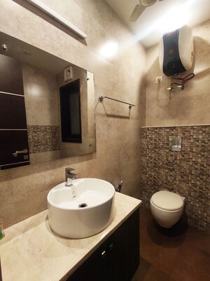 Bathroom in 4 BHK Apartment at Ansal Sushant Floors, Sushant Lok ii – for Sale