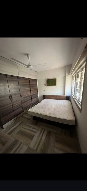 Bedroom in 2 BHK Apartment at Vibha CHS Malad West, Malad West – for Rent