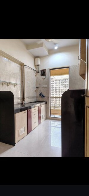 Kitchen in 2 BHK Apartment at Link Plaza Malad, Malad West – for Rent