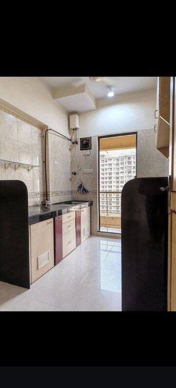 Kitchen in 2 BHK Apartment at Link Plaza Malad, Malad West – for Rent