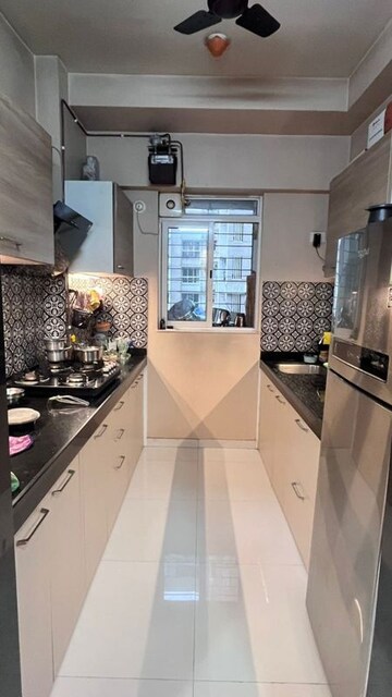 Kitchen in 3.5 BHK Apartment at Raj Tattva, Kapur Bawdi – for Rent