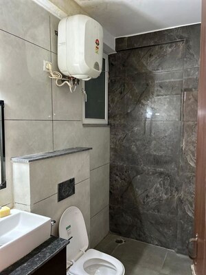 Bathroom in 3 BHK Apartment at Riverdale Hazelwood Residences, High Ground – for Sale