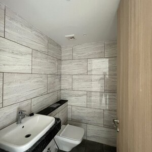 Bathroom in 4 BHK Apartment at Rustomjee Crown, Gokhale Road – for Rent