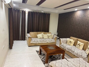 Living Room in 4 BHK Builder Floor at Ansal Sushant Apartments, Sushant Lok I – for Sale