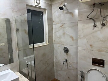 Bathroom in 4 BHK Builder Floor at Ansal Sushant Apartments, Sushant Lok I – for Sale