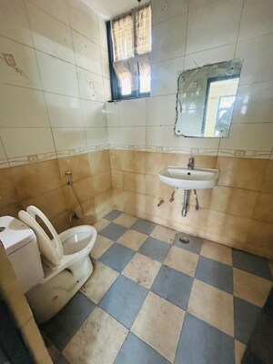 Bathroom in 3 BHK Apartment at Aiims Apartments, Sector 21d – for Rent