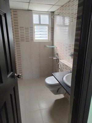 Bathroom in 3 BHK Apartment at Kolte Patil Raaga, Hennur Road – for Rent