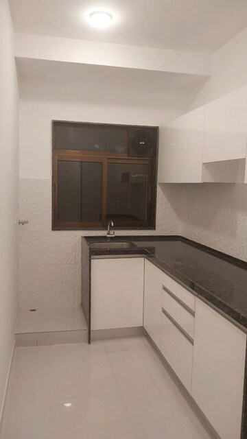 Kitchen in 1 BHK Apartment at DGS Sheetal Tapovan, Malad East – for Sale