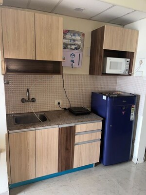 Kitchen in 1 RK Apartment at Supertech Ecociti, Sector 137 – for Rent