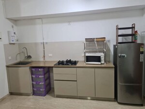 Kitchen in 1 BHK Apartment at KM Horizon Flora, Ghodbunder Road – for Rent