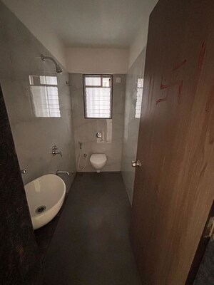 Bathroom in 2 BHK Apartment at Soham Parijat Gardens, Ghodbunder Road – for Rent
