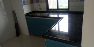 Kitchen in 2 BHK Apartment at Soham Parijat Gardens, Ghodbunder Road – for Rent