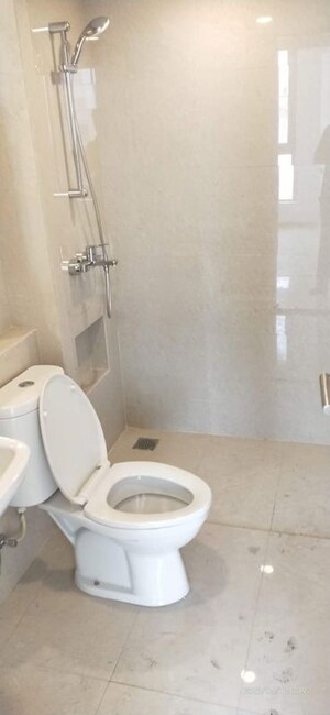 Bathroom in 2 BHK Apartment at KM Horizon Flora, Ghodbunder Road – for Rent