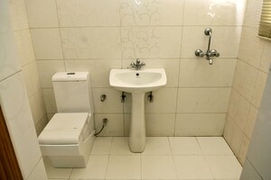 Bathroom in 2 BHK Apartment at Gulmohur Garden, Raj Nagar Extension – for Sale