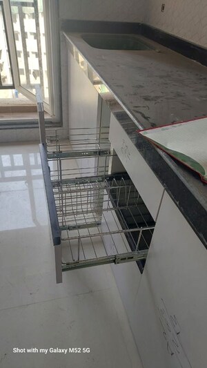 Kitchen in 2 BHK Apartment at Lalani Residency, Kavesar – for Sale