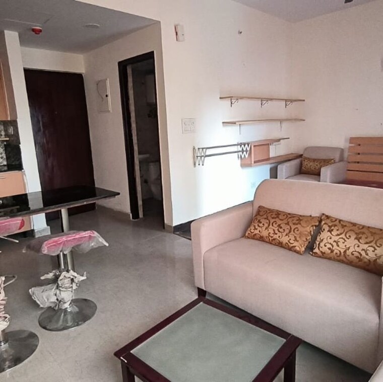 Living Room, supertech-czar-suites 1 RK 535 Sq.Ft. Apartment In Omicron I Greater Noida Greater Noida 10049040