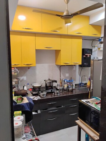 Kitchen in 1.5 BHK Apartment at New Ambivali, Andheri West – for Sale