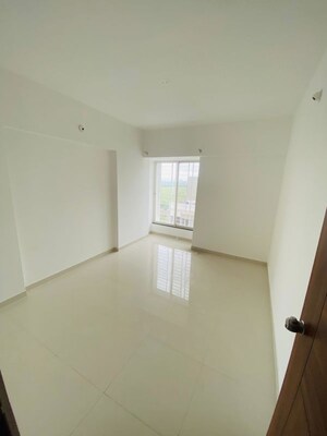 Room in 2 BHK Apartment at Laxmi Emerald, Lohgaon – for Rent