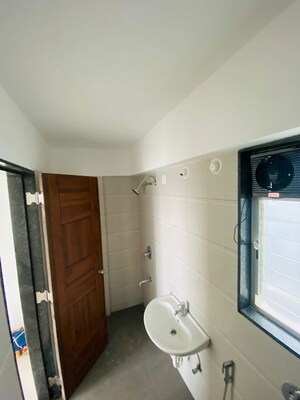 Bathroom in 2 BHK Apartment at Laxmi Emerald, Lohgaon – for Rent