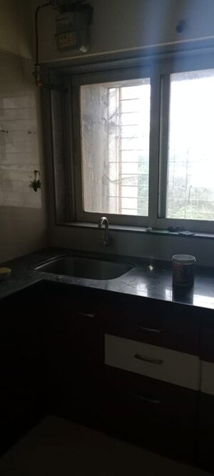 Kitchen in 1 BHK Apartment at Ace Aviana, Kasarvadavali – for Rent