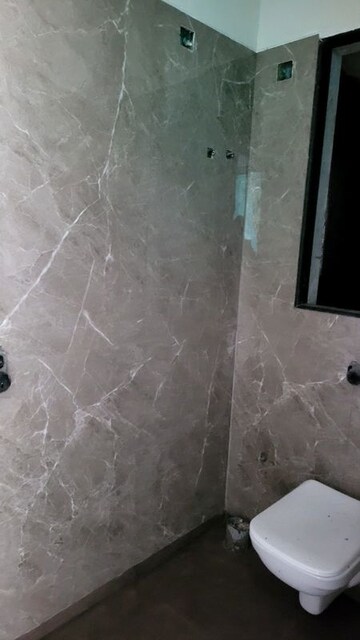 Bathroom in 2 BHK Apartment at Dream Arihant Niwara Sky, Sion – for Sale