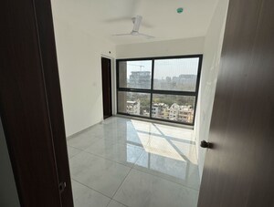 Bathroom in 3 BHK Apartment at Mantra Mirari, Pune East – for Rent