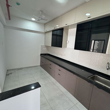 Kitchen in 3 BHK Apartment at Mantra Mirari, Pune East – for Rent