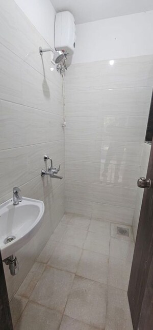 Bathroom in 1 BHK Apartment at Abhigna Avirahi Elegance, Malad West – for Rent