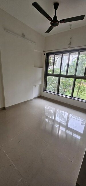 Room in 1 BHK Apartment at Abhigna Avirahi Elegance, Malad West – for Rent