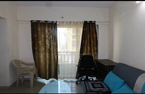 Living Room in 1 BHK Apartment at Ram Pushpanjali Residency, Owale – for Rent