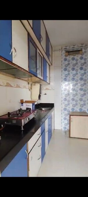 Kitchen in 2 BHK Apartment at Raj Uday Apartment, Sanpada – for Rent