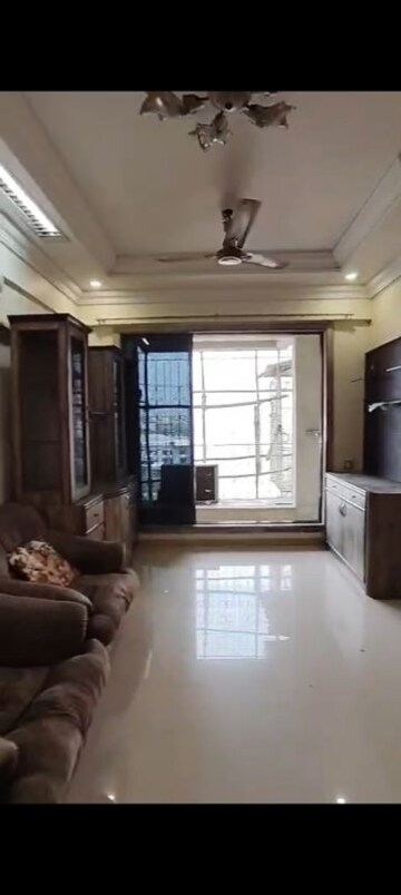Living Room in 2 BHK Apartment at Raj Uday Apartment, Sanpada – for Rent