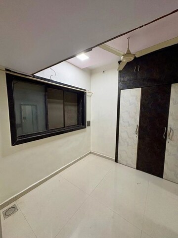 Room in 2 BHK Apartment at Gurudrishti CHS, Andheri West – for Rent
