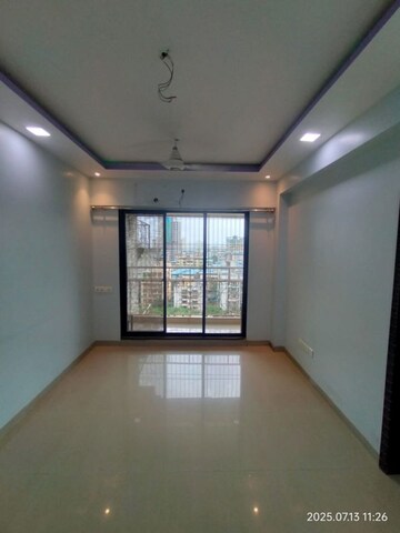 Living Room in 1 BHK Apartment at Yasho Deep Heights, Gothivali Village – for Sale