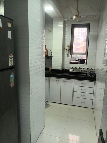 Kitchen in 2 BHK Apartment at Vidhani Cottage, Malabar Hill – for Rent