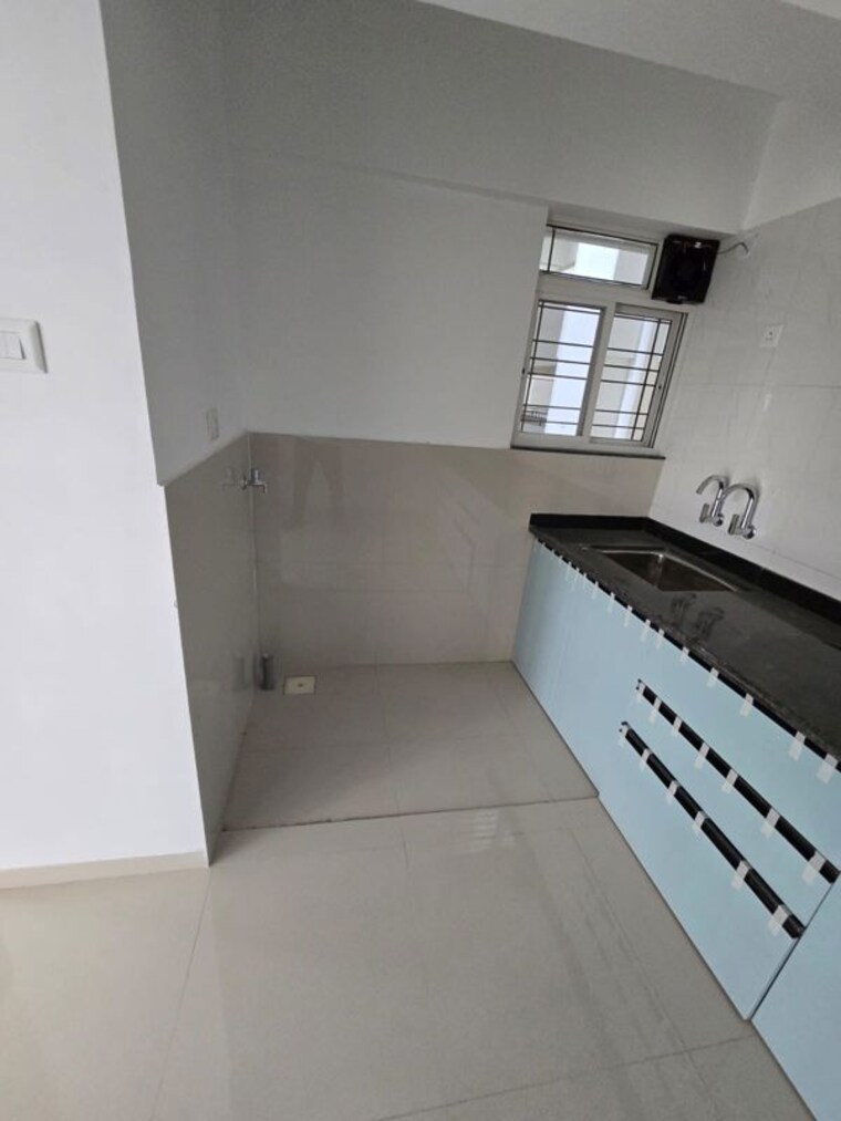 Kitchen, goyal-my-home-mh-14 2 Bedroom 750 Sq.Ft. Apartment In Punawale Pune 10049630