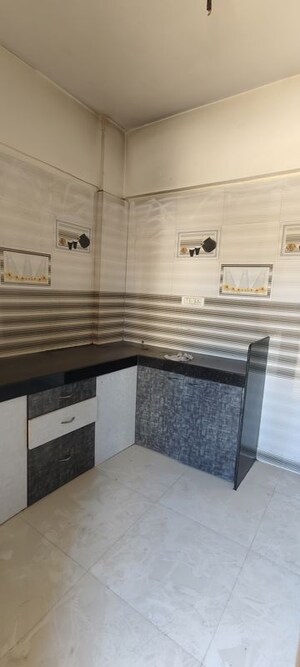 Kitchen in 1 RK Apartment at Amish Park, Mira Road – for Sale