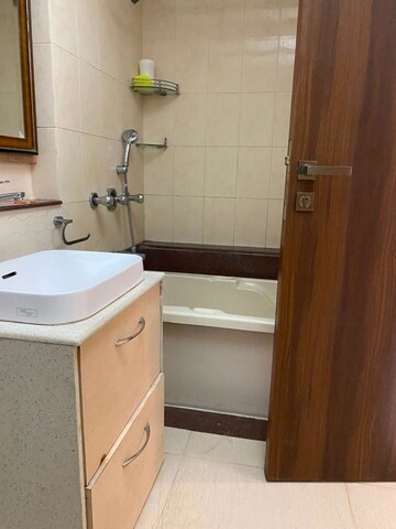 Bathroom in 3 BHK Apartment at Breach Candy Gardens, Cumbala Hill – for Rent